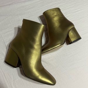 Gold ankle booties size 9.5 with a zip on the side